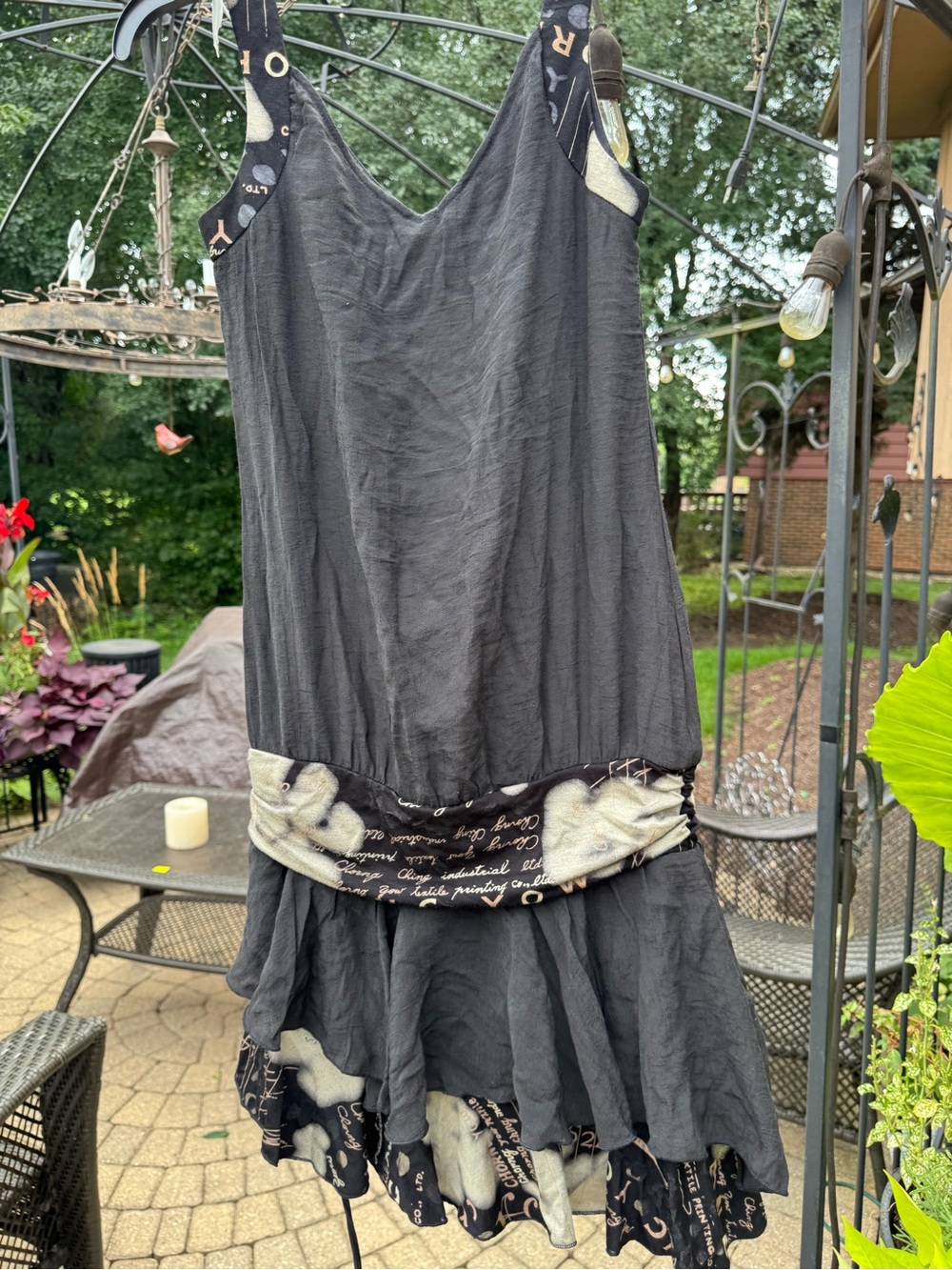 Women’s Black Sleeveless Ruffled Dress with Script Trim